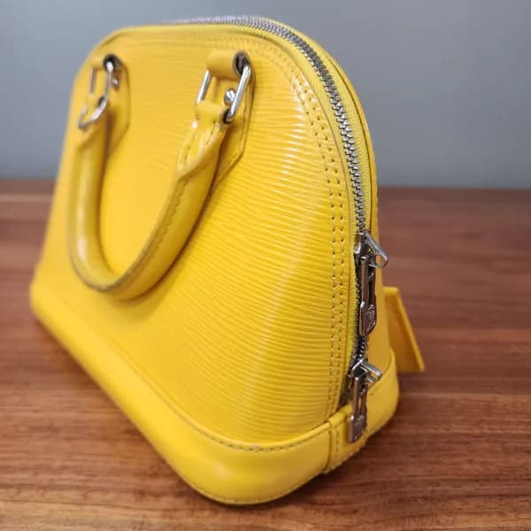 Louis Vuitton Alma Yellow Epi Leather Handbag, interior view
