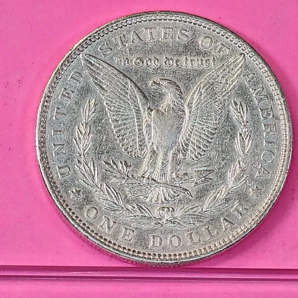 1883 Morgan Silver Dollar, side view
