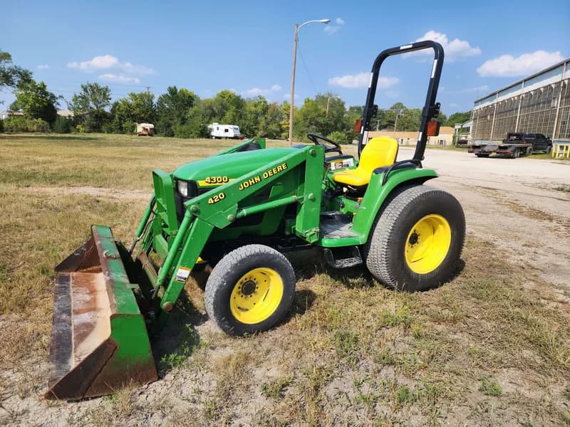John Deere 4300 Compact Utility Tractor w/ Loader, side view