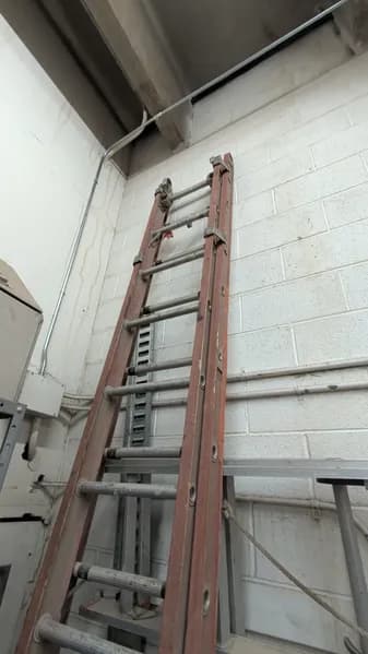24-Foot Extension Ladder w/ Metal Rungs Red Steel, side view