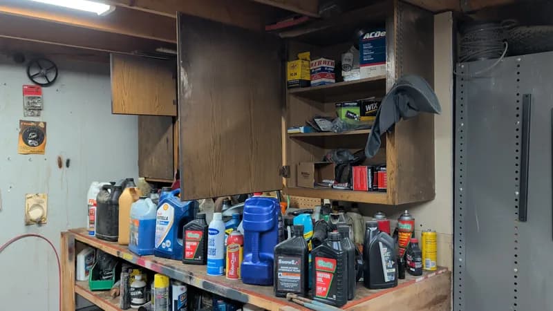 Large Lot of Automotive Fluids, Oils & Maintenance Products, side view