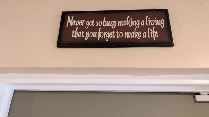 Motivational Wall Sign – Never Get So Busy Making a Living, primary view