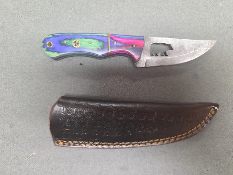 Fixed Blade Knife w/ Bear Cutout Damascus-Pattern Blade & Leather Sheath, side view