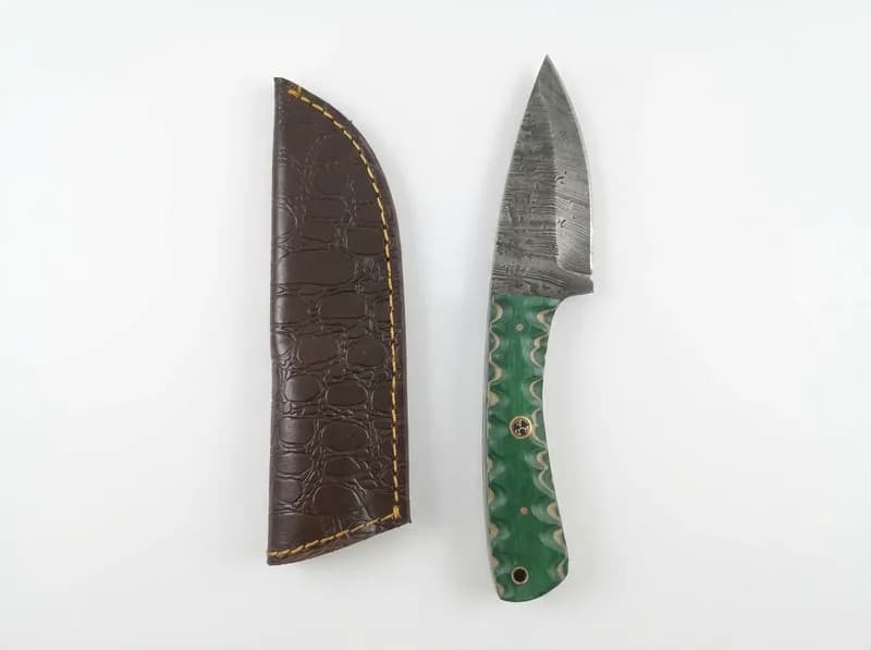 Fixed Blade Knife with Green Patterned Handle and Brown Leather-Style Sheath, primary view