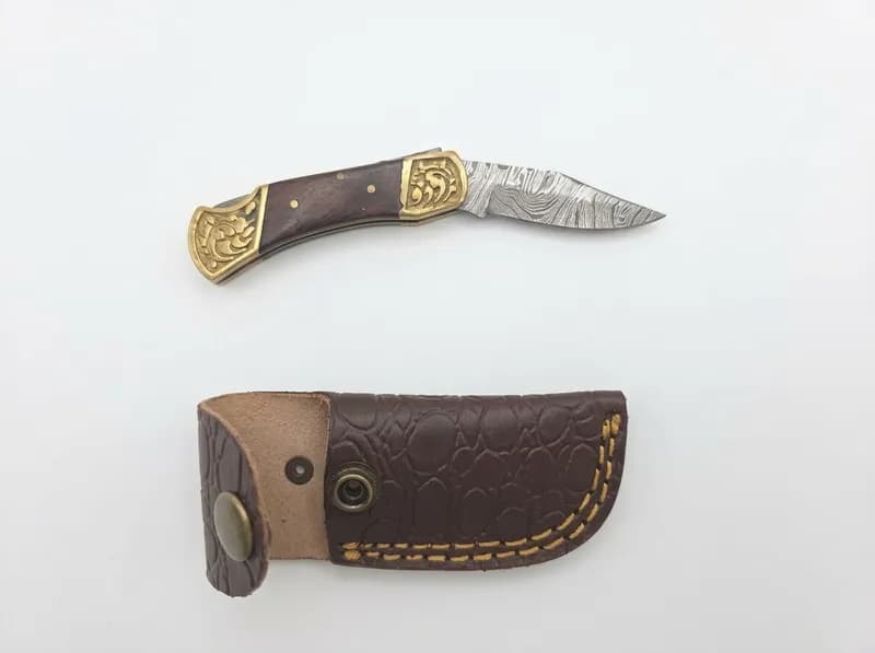 Damascus-Pattern Folding Pocket Knife w/ Brass Bolsters & Leather Sheath, primary view